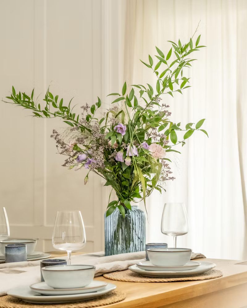 Fresh flowers on a set table